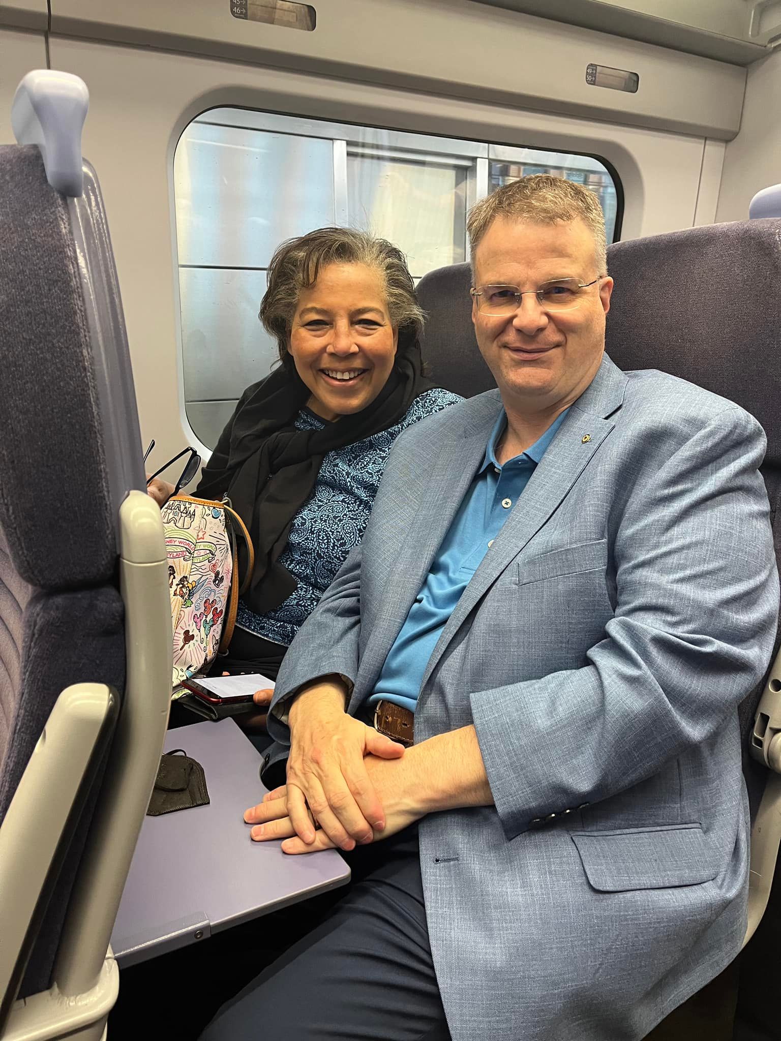 Eve of Lambeth - July 26: Bishop Hughes and her husband David Smedley on the tran from London to Canterbury. KEVIN NICHOLS PHOTO