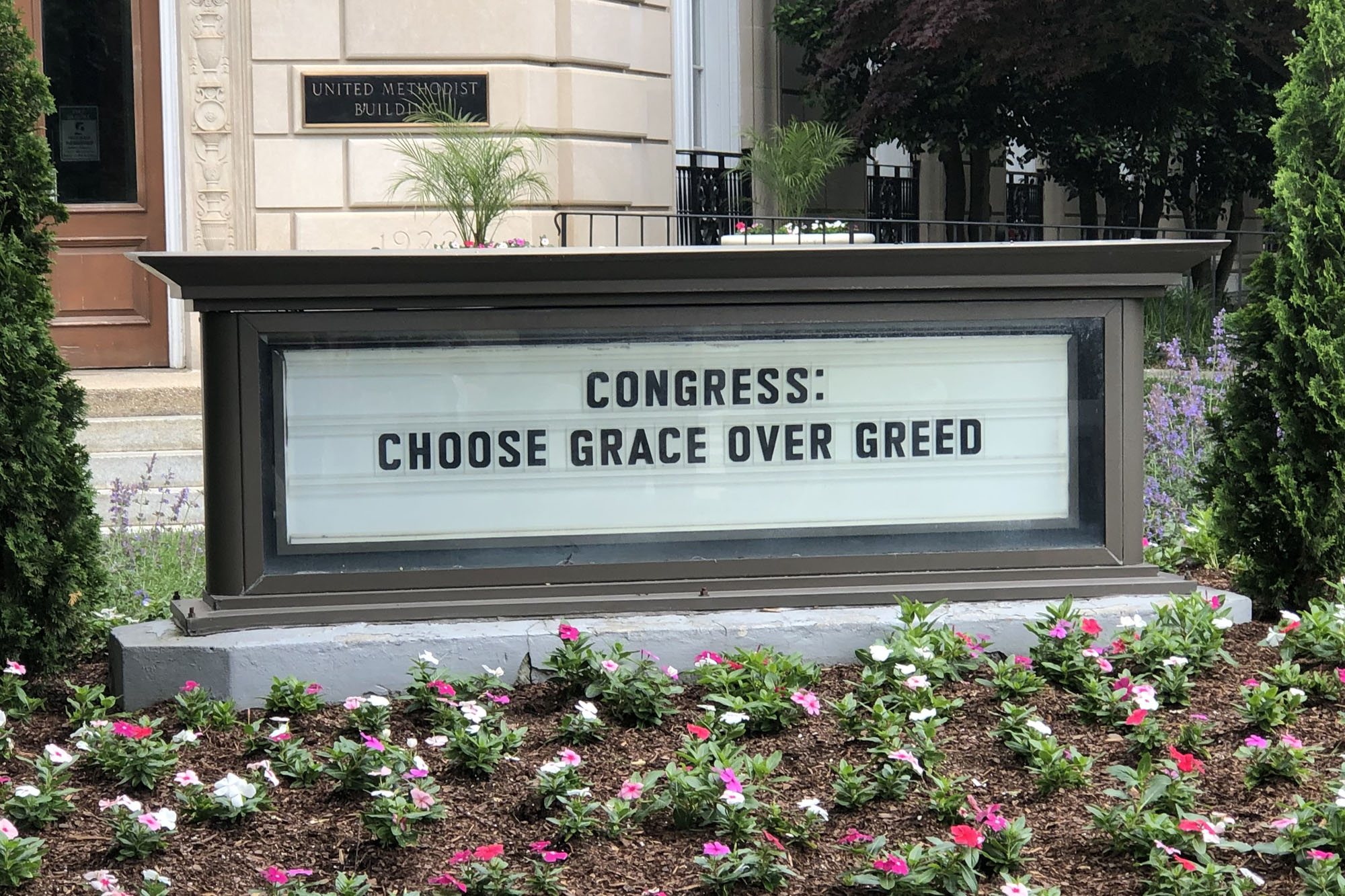 "Congress: Choose Grace Over Greed." DAVID SMEDLEY PHOTO