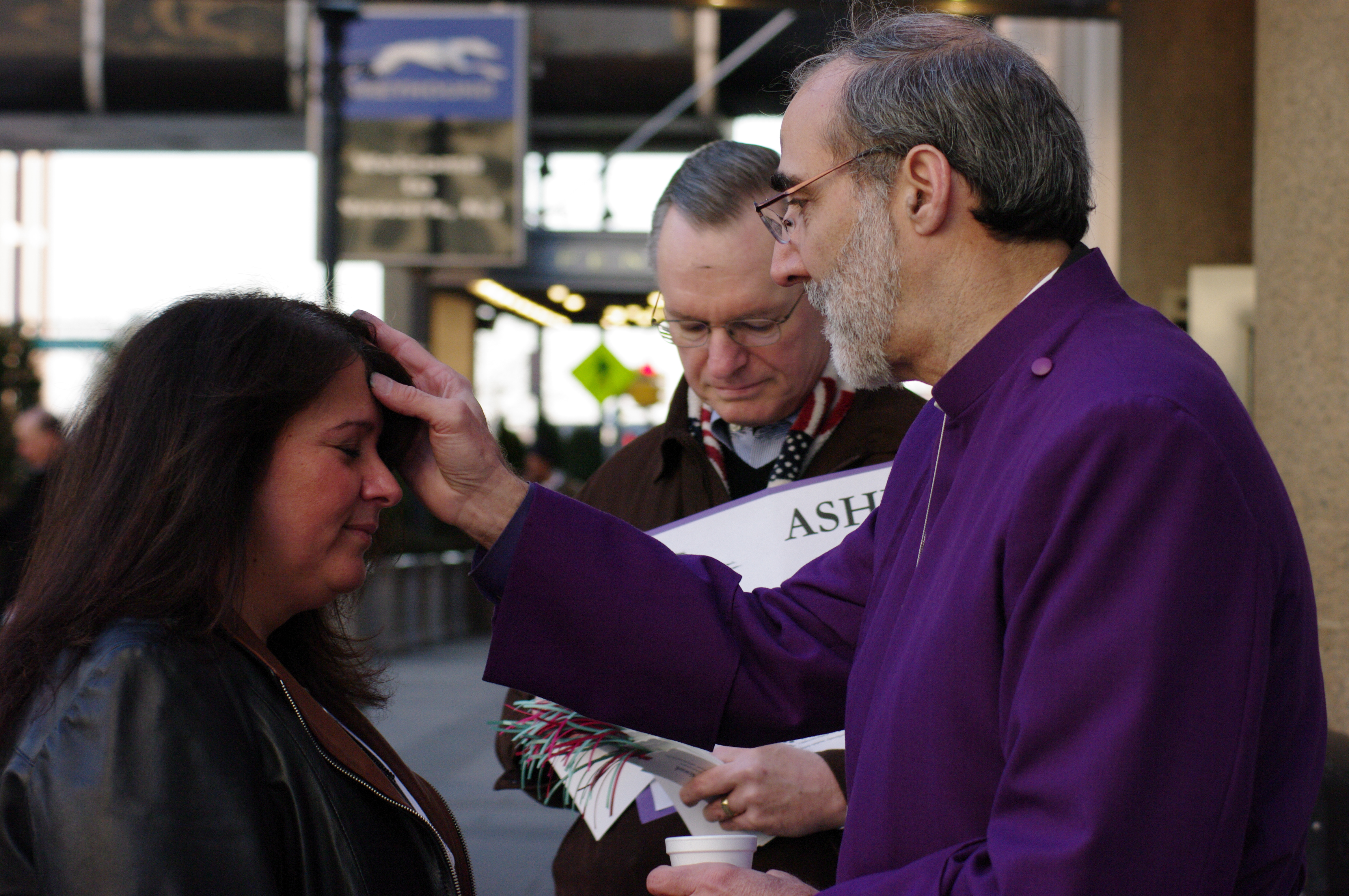 Bishop Mark Beckwith giving Ashes to Go at Newark Penn Station