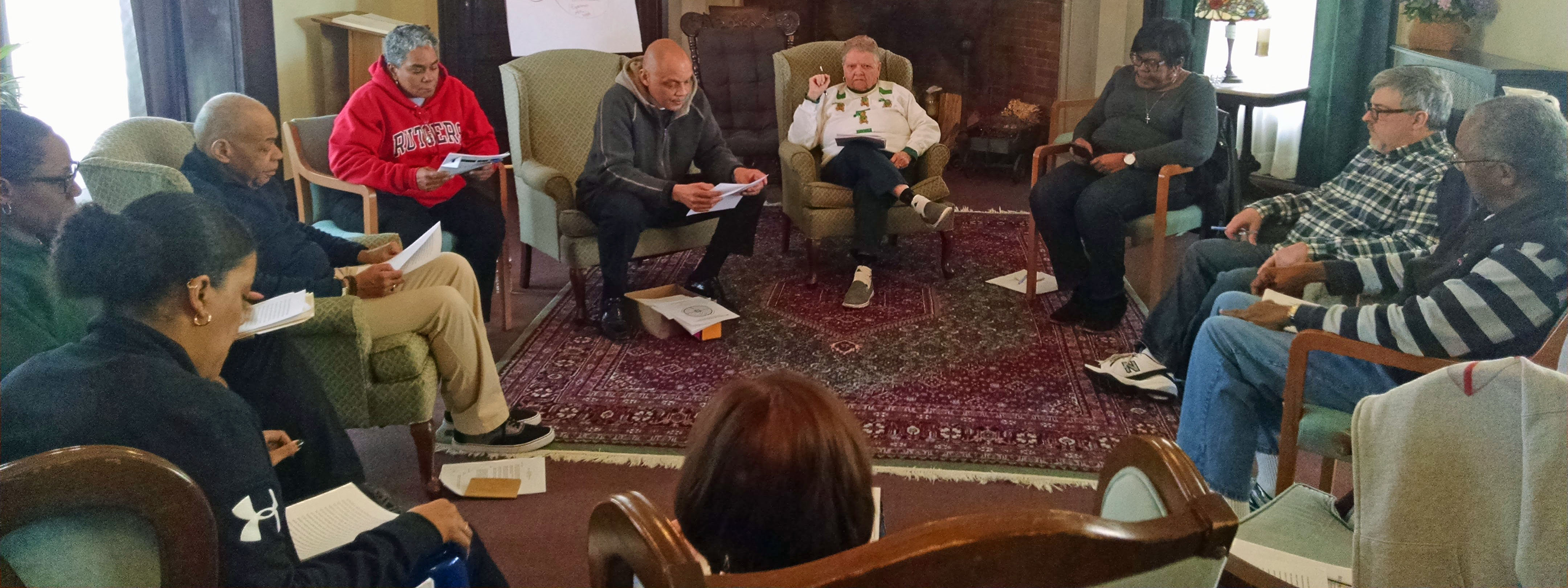 Namaste Commission members attending a March 2018 retreat led by the Rev. Charles Wynder, Jr., Episcopal Church Staff Officer for Social Justice and Advocacy Engagement.