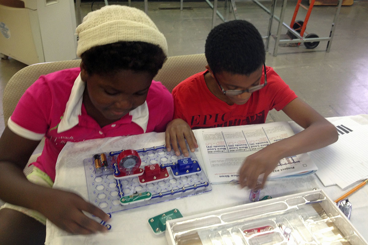 Two participants in Holy Trinity, West Orange's "Science and God" program