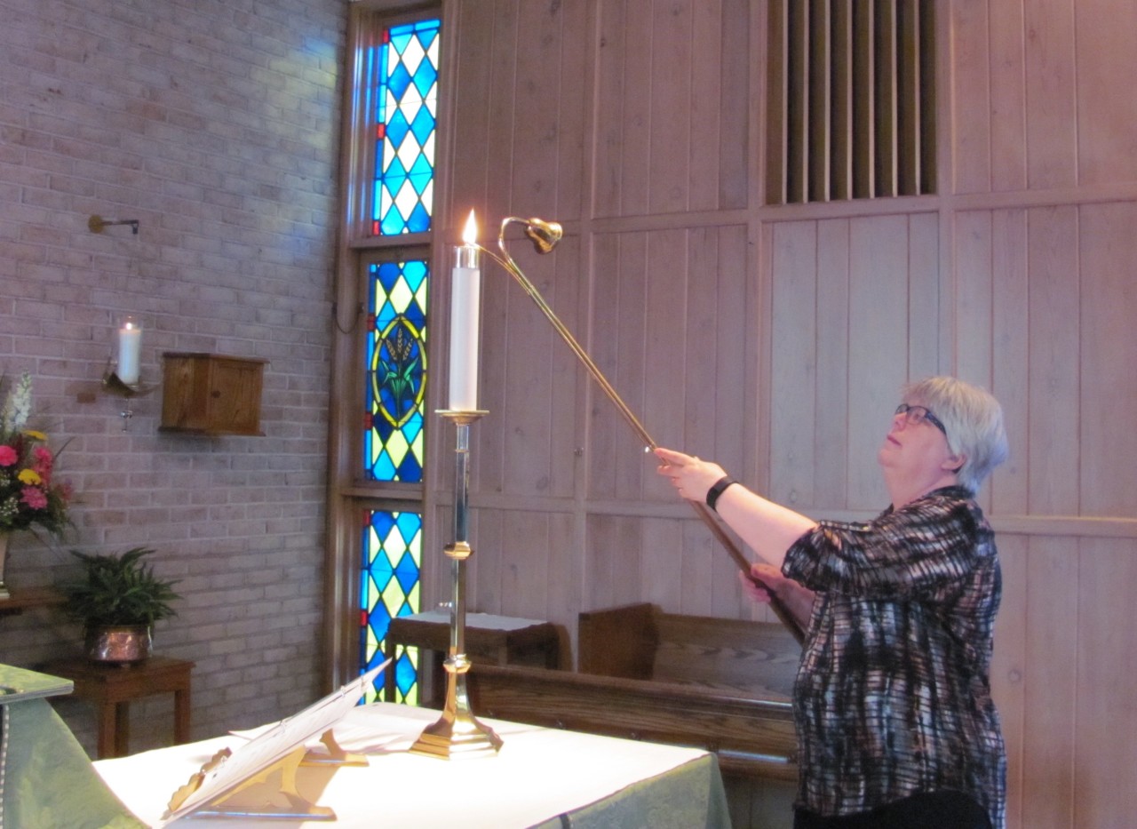 An acolyte at work in St. David's sanctuary.