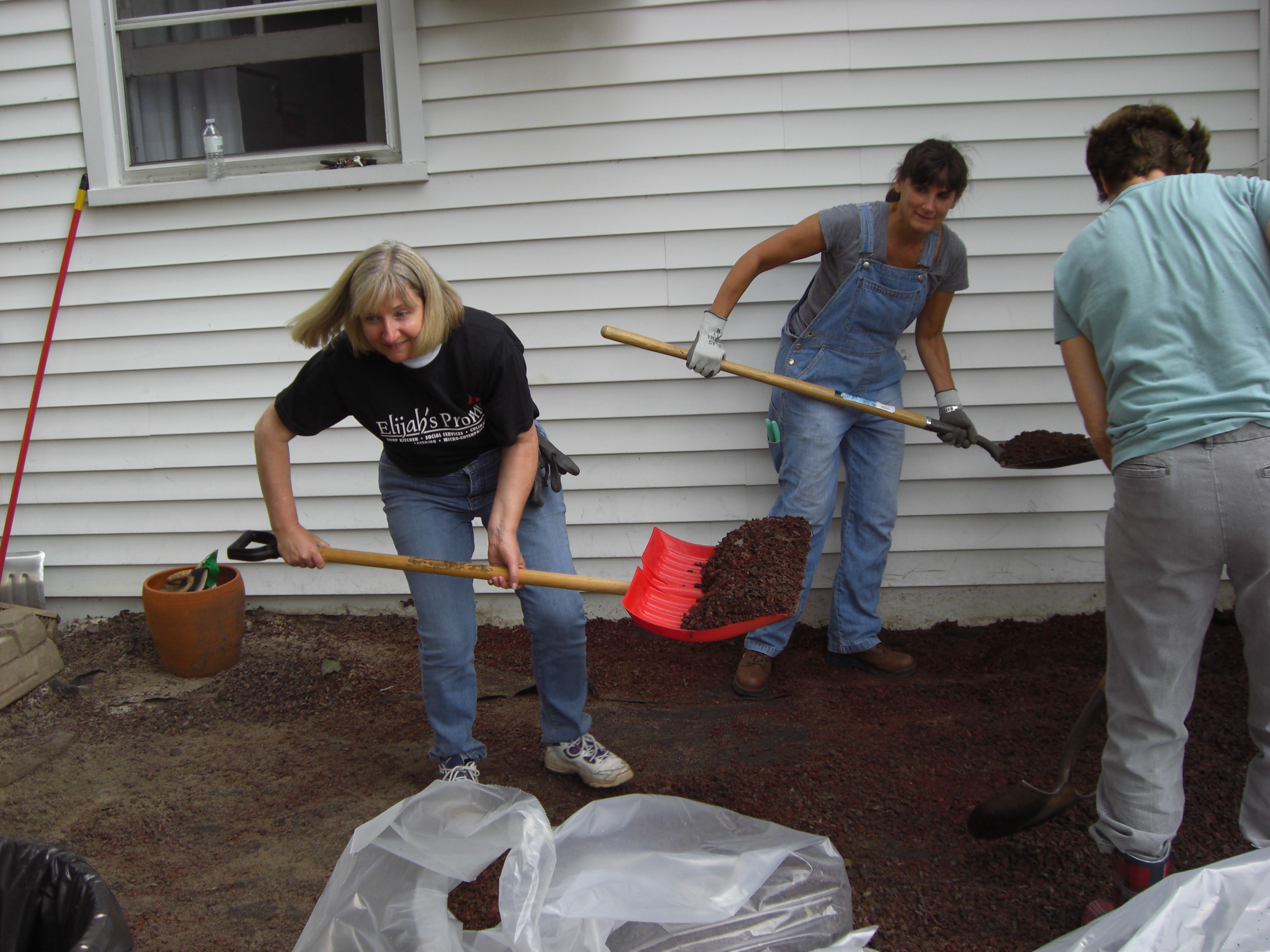 The Rev. Sheelagh Clarke and St. Stephen's parishioners cleaning up after Irene