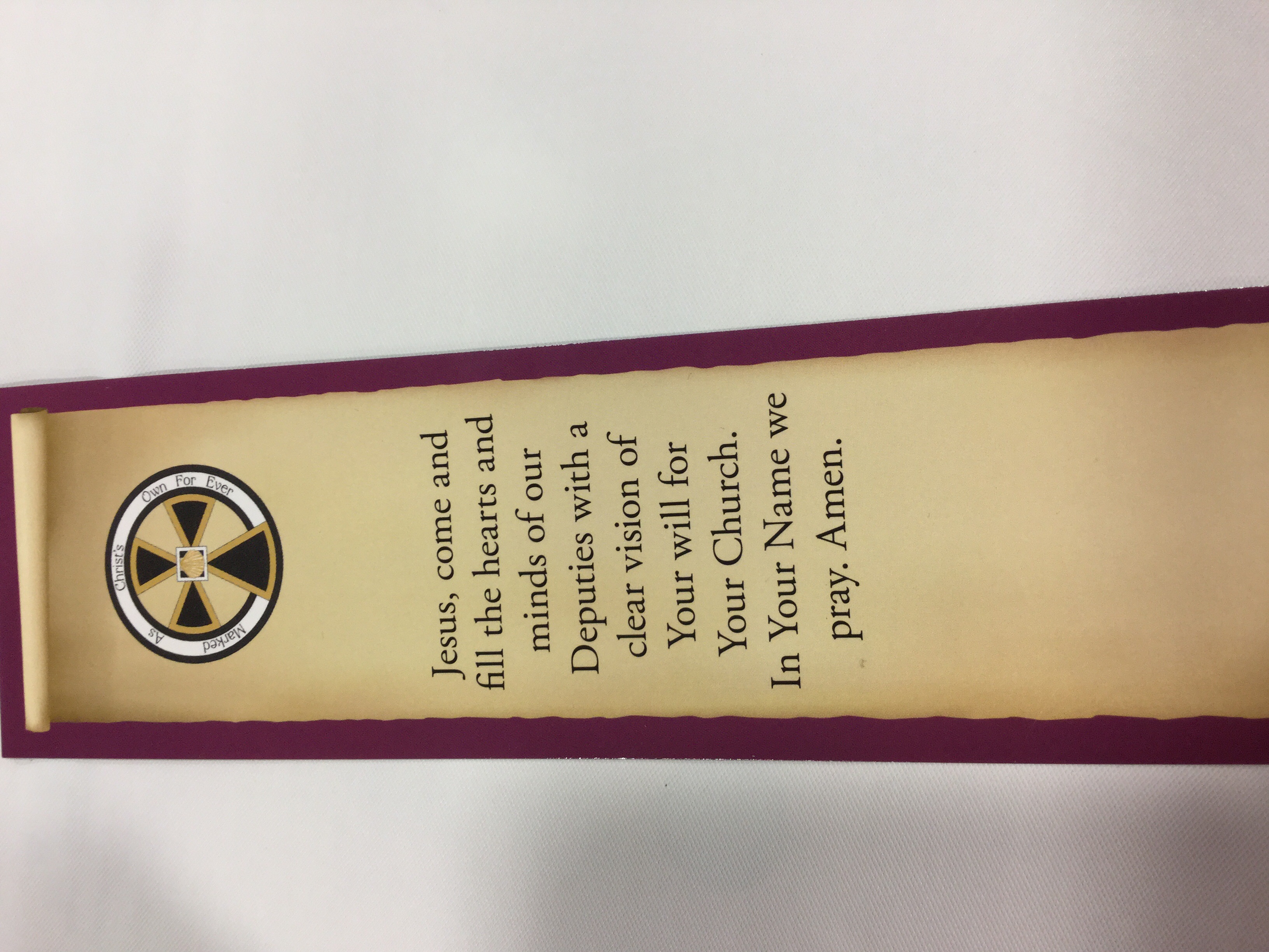 The prayer card placed at each deputy seat.