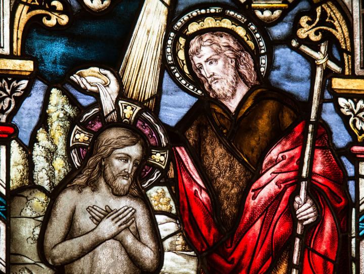 Stained glass window of the Baptism of Our Lord