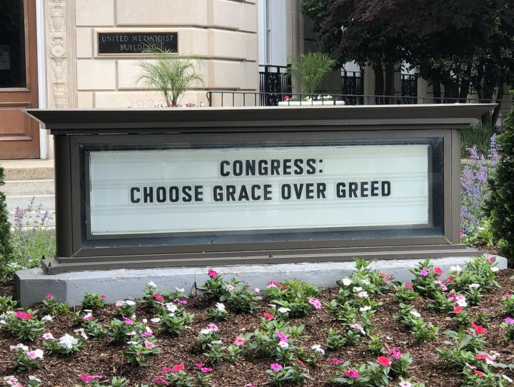 "Congress: Choose Grace Over Greed." DAVID SMEDLEY PHOTO