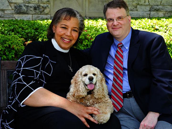 Bishop-elect Carlye Hughes, her husband David Smedley, and their dog Abbey.