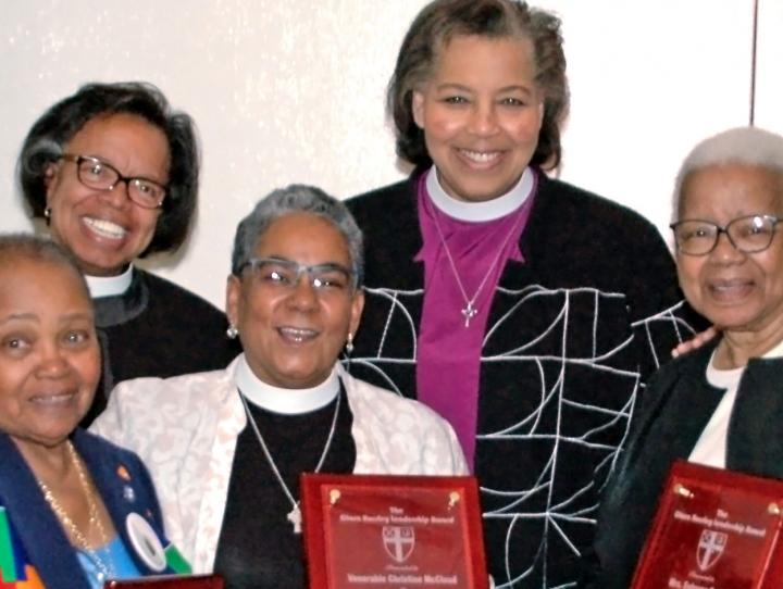 Front row, l-r: Recipients, A. Lorraine Jones, the Ven. Christine McCloud, Sebrena Davis and the Rev. Lynn Collins. Back row, l-r: UBE members, the Rev. Dr. Miguel Hernandez and  the Rev. Dr. Michelle White; Bishop Carlye Hughes; and recipient, the Rev. Canon Gregory A. Jacobs.