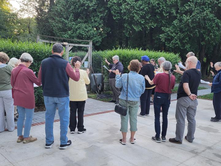 Canon Wright leads a Rite of Blessing for the Garden of Hope.