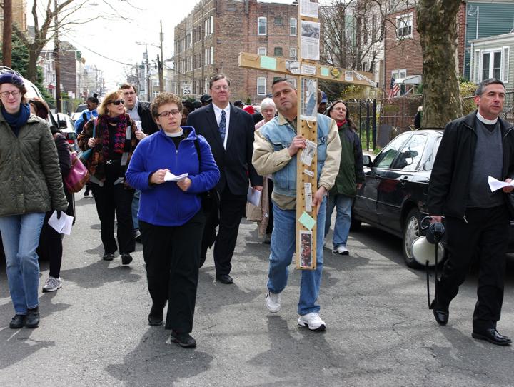 Carlos Hernandez of Grace Van Vorst carries the cross