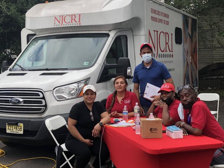The NJCRI team and their mobile COVID vaccine clinic. ALEEDA CRAWLEY PHOTO