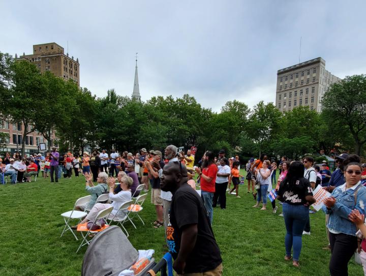 The crowd at March for Our Lives in Newark's Military Park. The spire of Trinity & St. Philip's Cathedral can be seen in the background. DIANE RILEY PHOTO