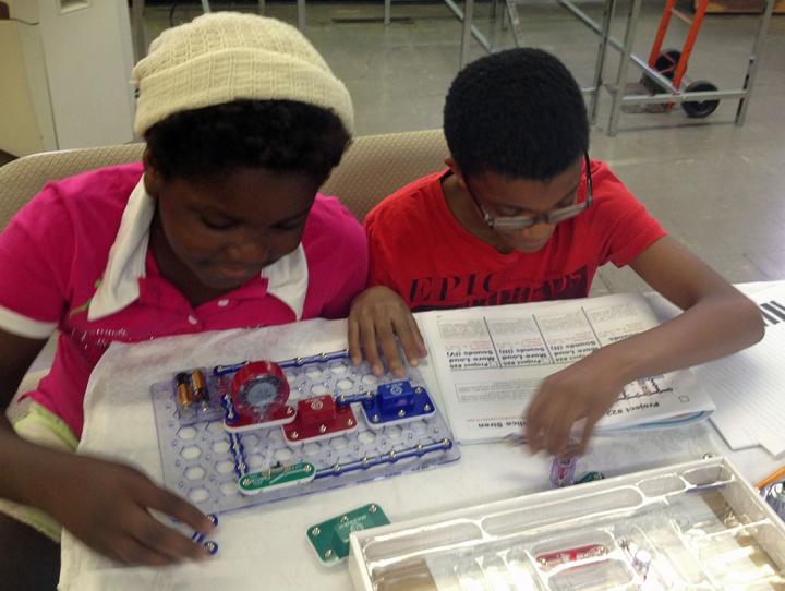 Two participants in Holy Trinity, West Orange's "Science and God" program