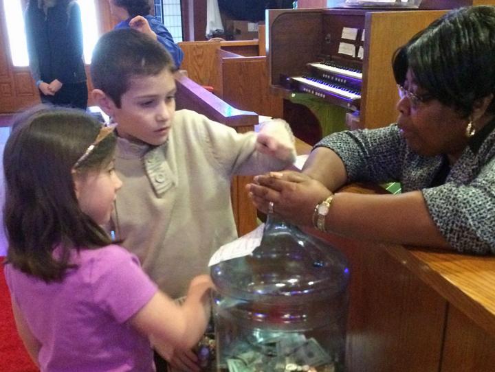 Young parishioners at St. Matthew's, Paramus make their own contributions