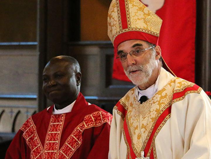 The Rev. Sylvester Ekunwe with Bishop Mark Beckwith at his ordination on June 17, 2017.