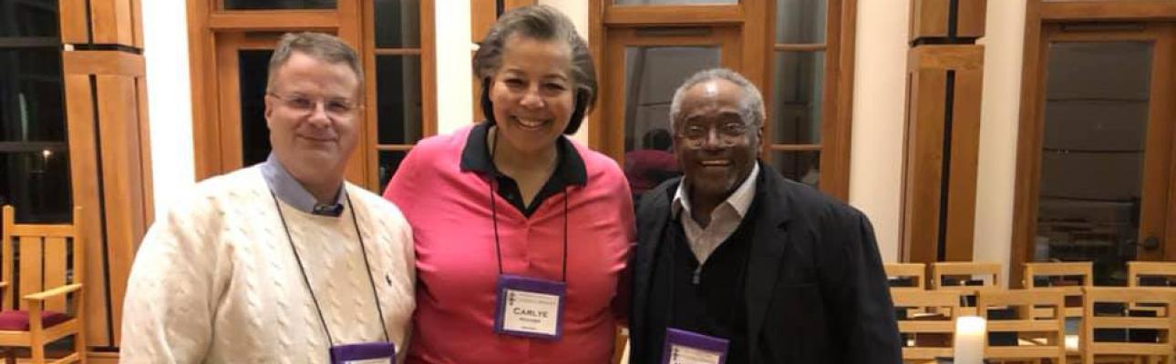 Bishop Hughes and her husband David Smedley with Presiding Bishop Curry in January 2019.