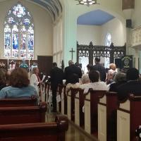 MC Rev. Audrey Hasselbrook passes the mic to Holy Trinity Church, West Orange