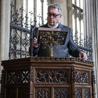 The Rev. Dr. Timothy Mulder, Rector of Christ Church in Short Hills, reading during an Evensong at Bristol Cathedral.