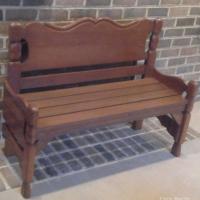 Chris Martin repurposed a bed frame to create this bench.