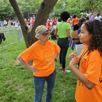The Rev. Deacon Diane Riley talks with high school student Maylyn Rodriguez speaks at the March. ELVEN RILEY PHOTO