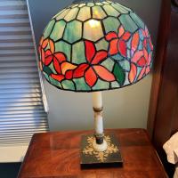 Colleen Hintz began studying stained-glass making in 1980 to learn how to create a shade for her great-grandmother’s lamp. She eventually created a shade with a woodbine pattern.