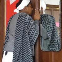 Harriet Tubman, portrayed by Ayana Stewart, watches for slave catchers during a re-enactment of the Underground Railroad at St. James Episcopal Church in Upper Montclair. SHARON SHERIDAN PHOTO