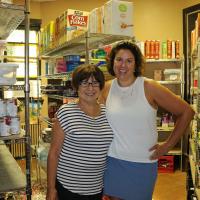 Food pantry co-directors Joanne Scalpello, who also serves as senior warden at Holy Communion, and Karen Galow, who is a community member.
