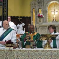 Presiding Bishop Michael Curry celebrates the Eucharist at St. Paul's, Paterson, assisted by the Rev. Deacon Erik G. Soldwedel and the Rev. Dr. Beth Faulk Glover. SHARON SHERIDAN PHOTO