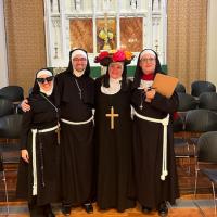 The clergy and staff at St. George's, Maplewood wore costumes representing different roles of St. Hildegard of Bingen.