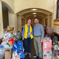 The Rev. Andy Olivo with the Ukrainian-American woman who drove an hour from Norwalk, CT to bring donations to St. Elizabeth's.