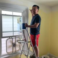 The Rev. George Wong, formerly of of Church of the Saviour, Denville joined the mission "trip" to paint the house. PHOTO COURTESY ST. PETER'S, MOUNTAIN LAKES