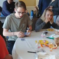 The teens play games and eat hot meals provided for them by members of the Diocese of Newark. KATHRYN KING PHOTO