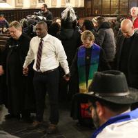 The interfaith clergy pray together in Grace Church, Newark after Guerrero receives his extension. NINA NICHOLSON PHOTO