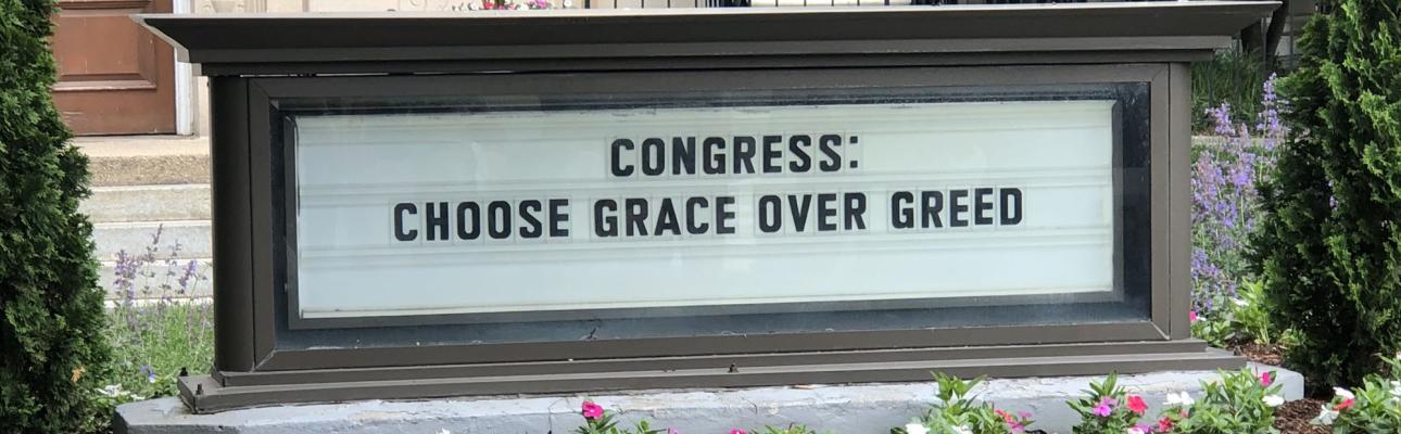 "Congress: Choose Grace Over Greed." DAVID SMEDLEY PHOTO