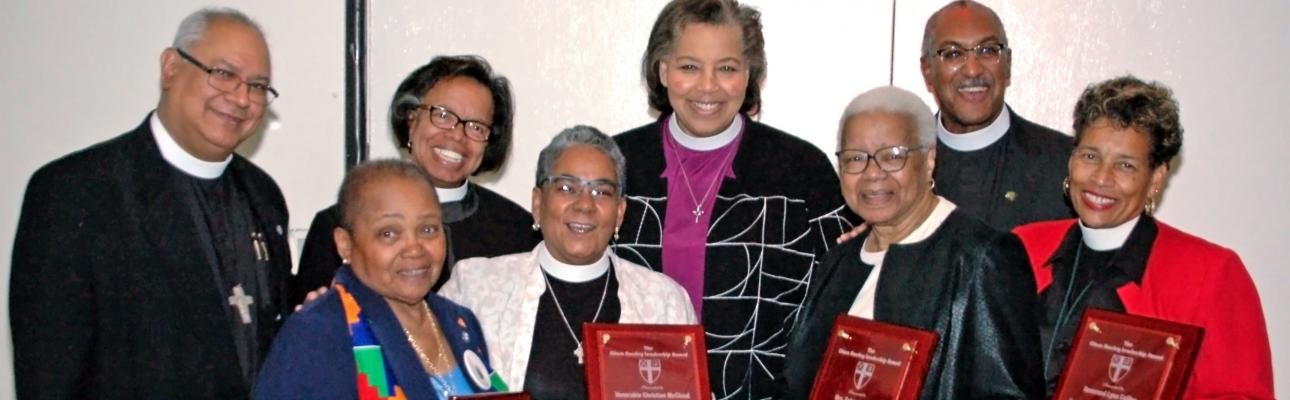 Front row, l-r: Recipients, A. Lorraine Jones, the Ven. Christine McCloud, Sebrena Davis and the Rev. Lynn Collins. Back row, l-r: UBE members, the Rev. Dr. Miguel Hernandez and  the Rev. Dr. Michelle White; Bishop Carlye Hughes; and recipient, the Rev. Canon Gregory A. Jacobs.