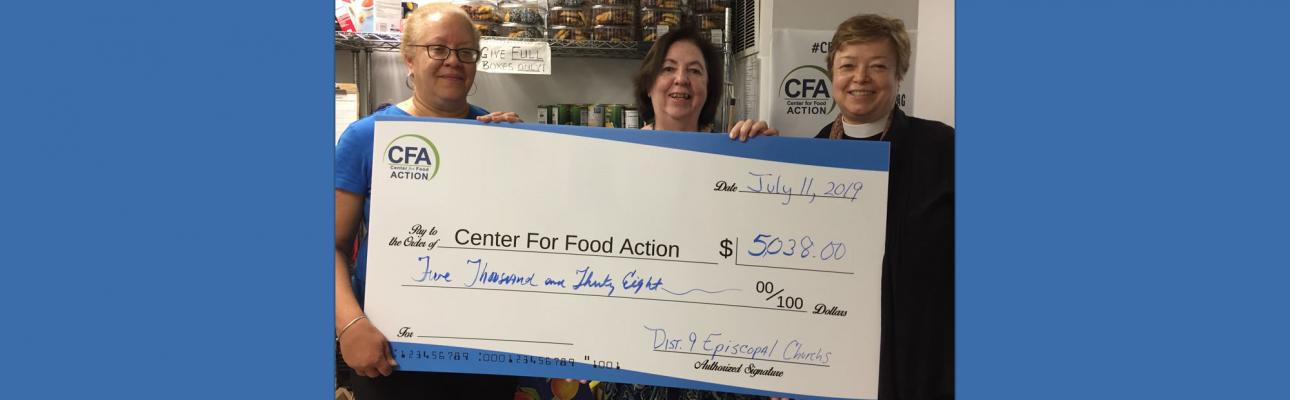 Claudia Smith of St. Luke’s, Haworth and co-chair of our 2019 Lenten Offering Committee (left) and the Rev. Lynne Bleich Weber, District 9 Convener (right) present a check to Pat Espy, Executive Director of the Center for Food Action.