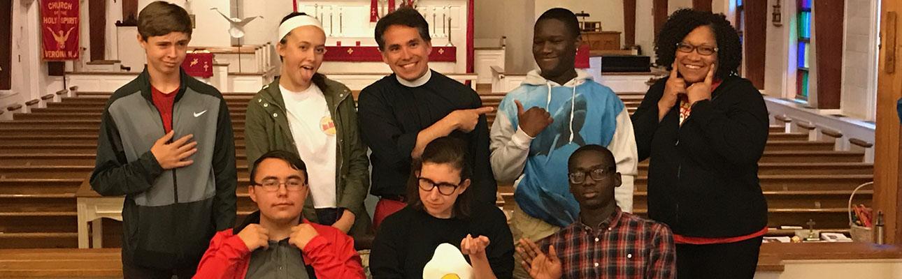 The Rev. Jerry Racioppi (back row, center) and Rosie Grant (back row, right) with the six diocesan youth they are chaperoning to EYE17 in Oklahoma this July. CHARLES WHITE PHOTO