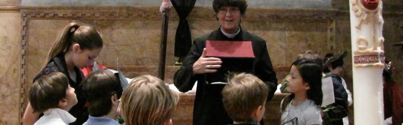 The Rev. Melissa Hall displays the Easter sepulcher created for Good Friday.