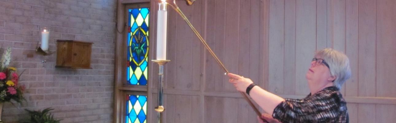 An acolyte at work in St. David's sanctuary.