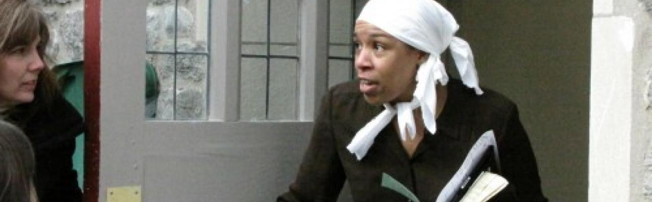 Danielle Baker playing the role of Underground Railroad conductor Harriet Tubman