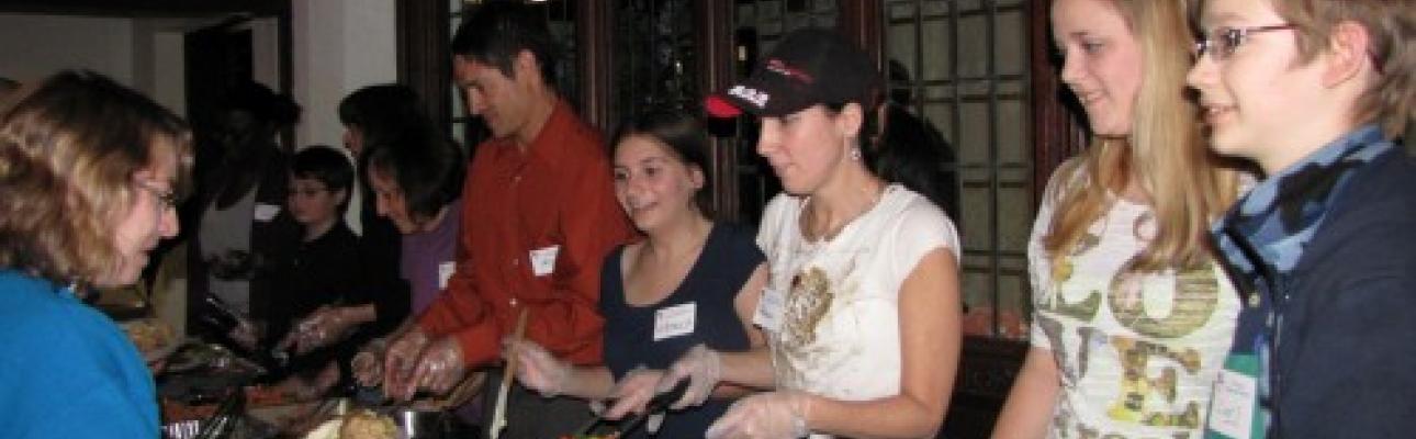 Members of St. Peter’s Morristown youth group serve dinner after Hurricane Sandy