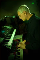 Chuck Hatfield on keyboards with Walkin' the Boulevard