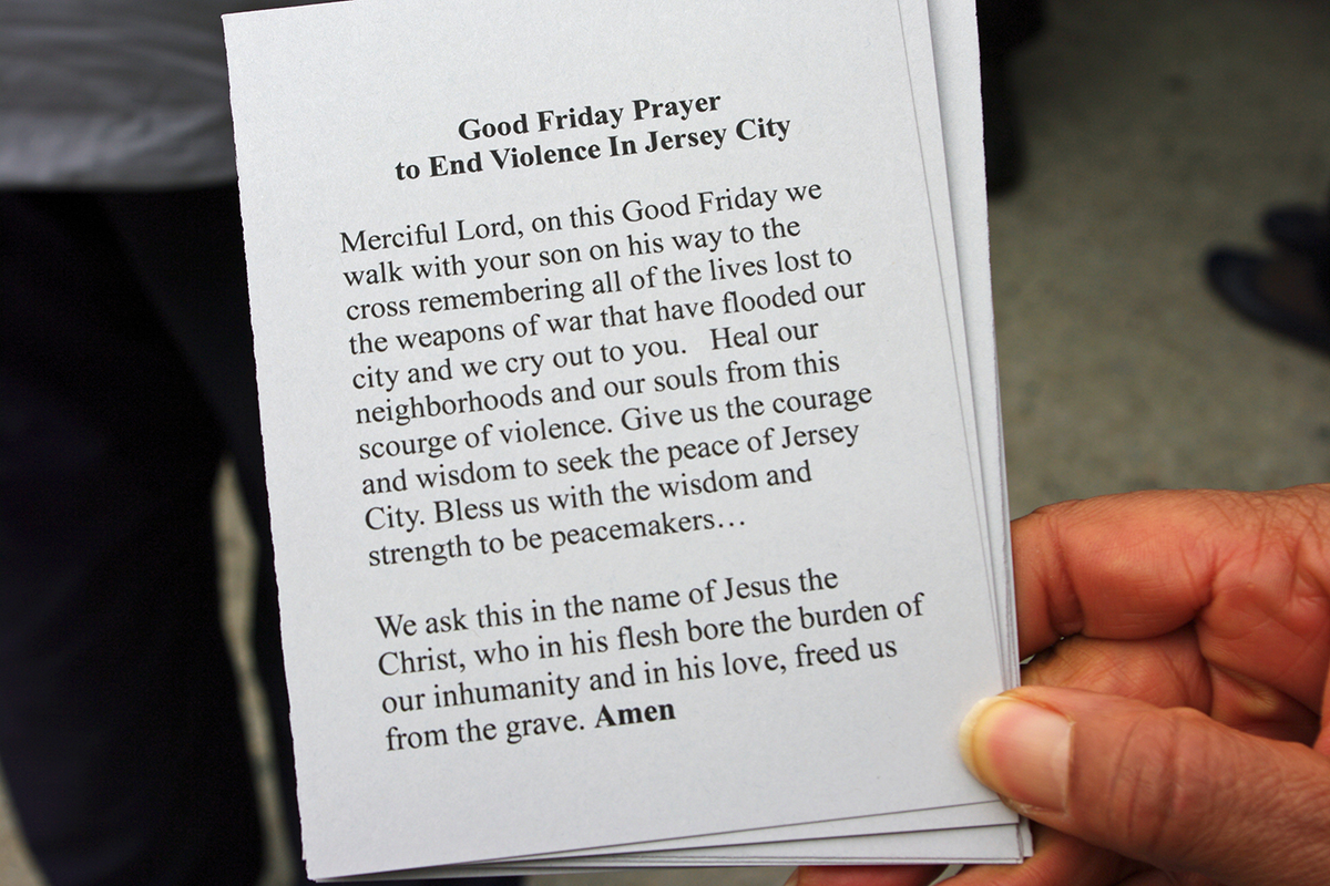Prayer cards were handed out to residents along the route.