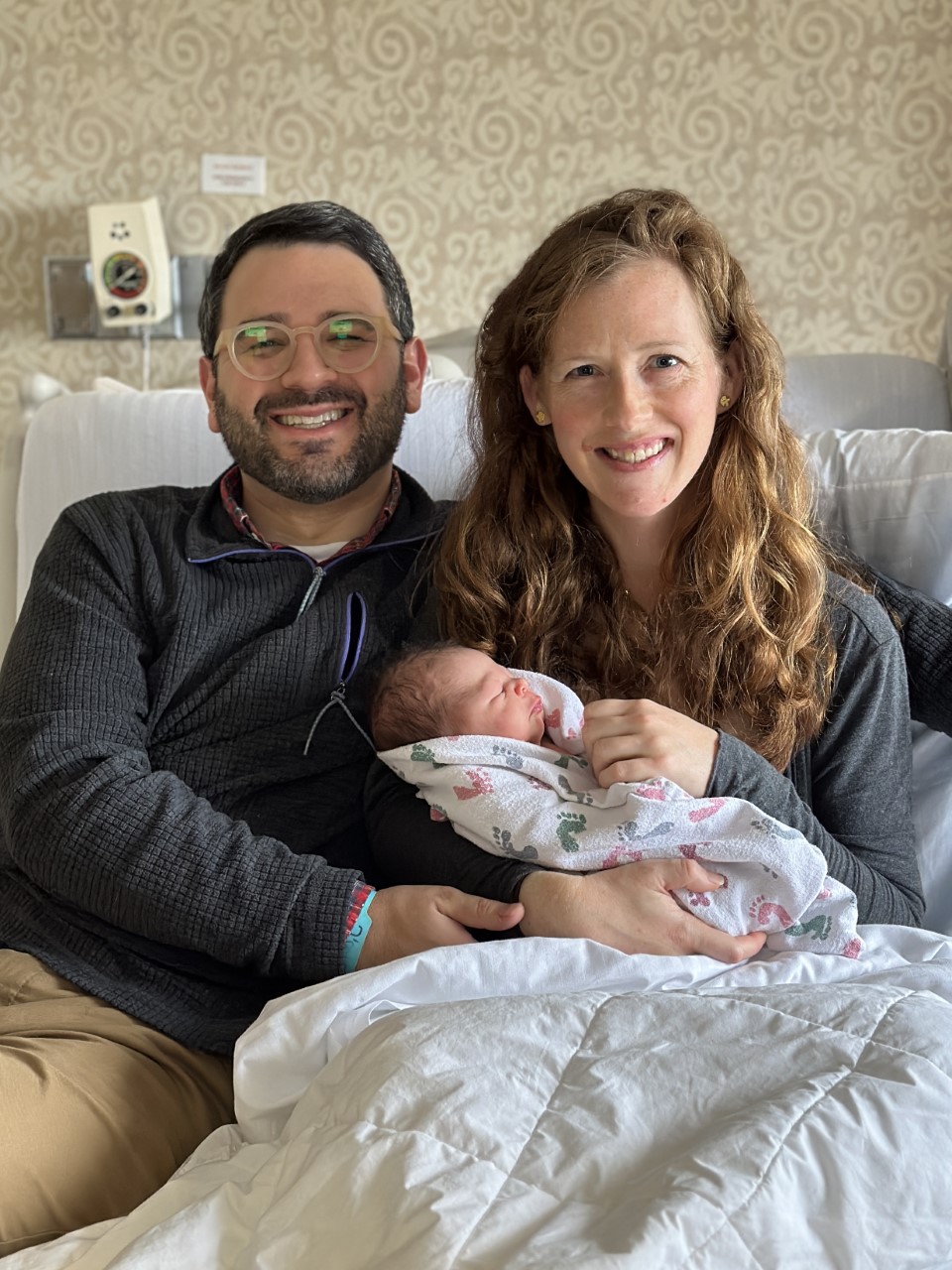 The Rev. Andy and Catherine Olivo with daughter Sydney