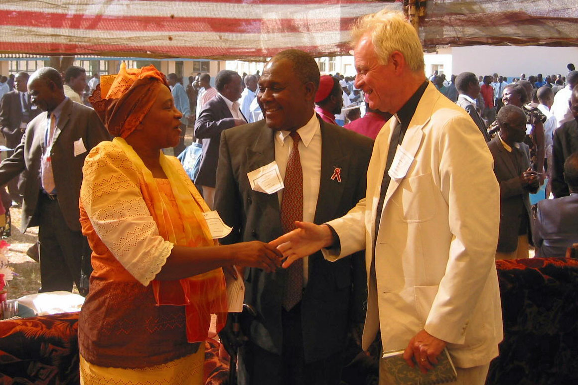 The Rev. Canon Wade Renn on a return visit to St. Mark’s Secondary School in 2003, talking to former student Emmanuel Hachibuka and his wife. At the time this photo was taken, Emmanuel Hachibuka was serving as a Member of the Zambian Parliament. PHOTO COURTESY THE REC. CANON WADE RENN