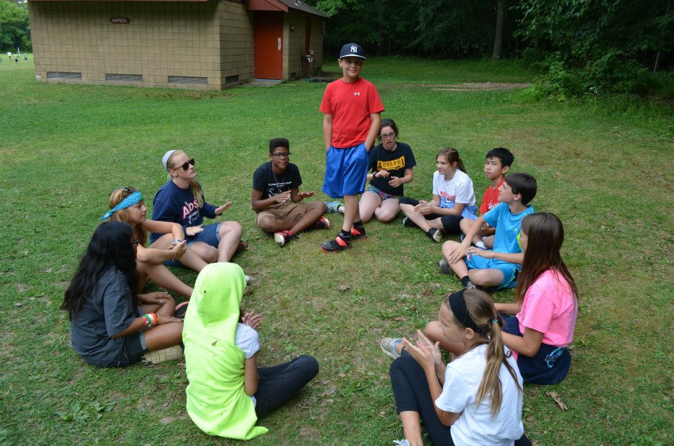 Campers playing circle games.