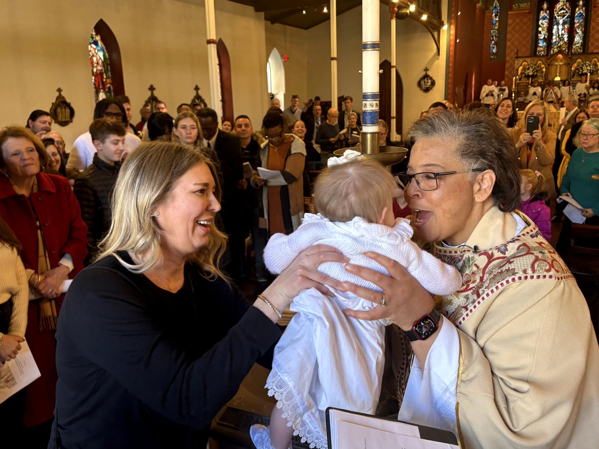 Bishop Hughes and baby