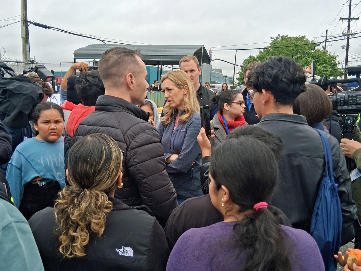 Governor Mikie Sherrill talks with detainee's family members outside Delaney Hall. MIGUEL HERNANDEZ PHOTO